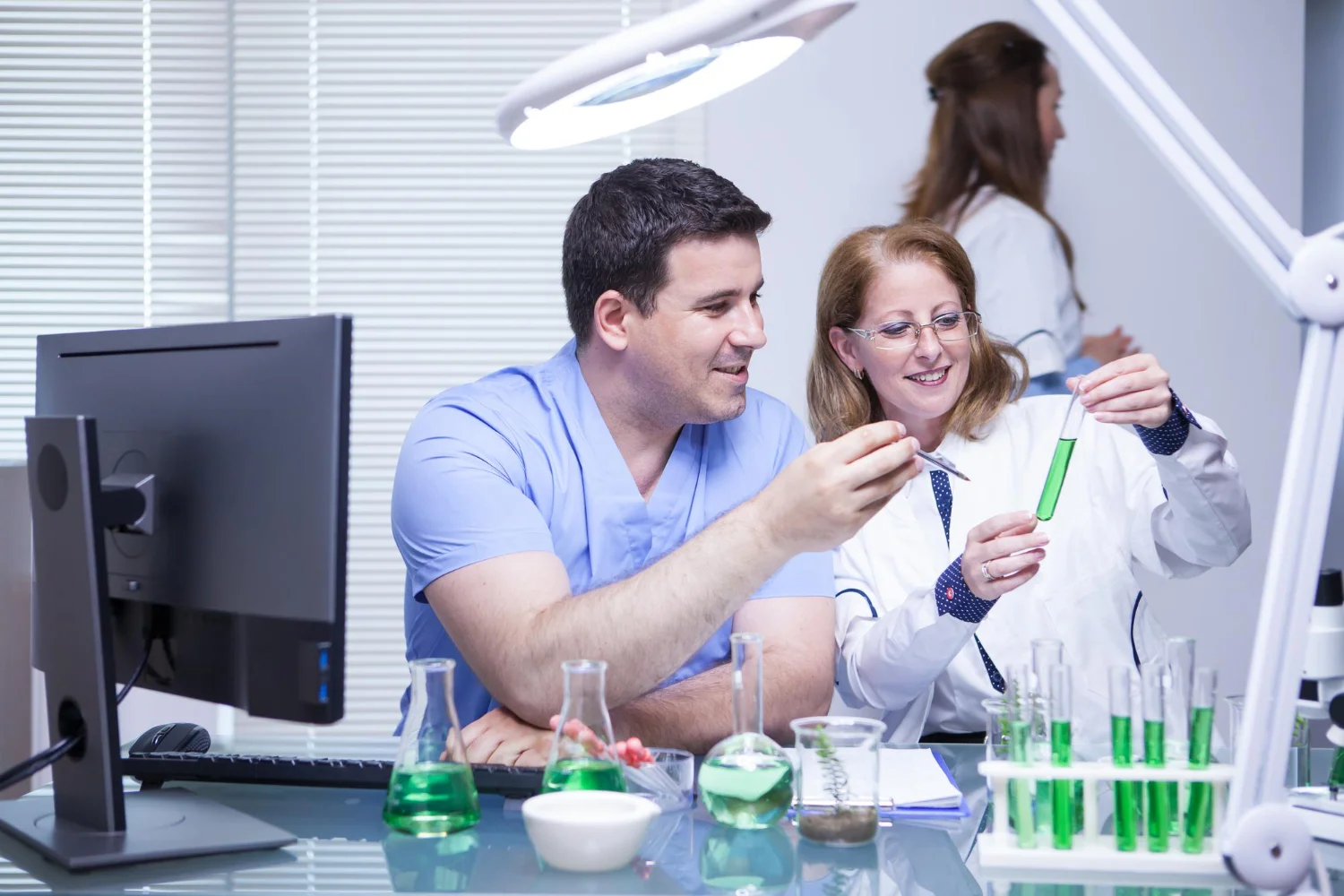 A pharmacist consulting with a healthcare provider